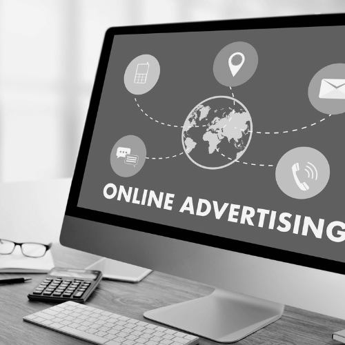 monitor z ikonami i napisem online advestrising